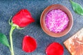Spa still life with roses, sea salt, soap on ceramic tile. Relax time concept Royalty Free Stock Photo