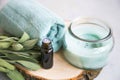 Spa still life set with candle and essential oil bottle Royalty Free Stock Photo