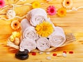 Spa still life with towel in wood spa. Royalty Free Stock Photo