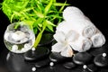 Spa still life of white hibiscus flower, bamboo, towels Royalty Free Stock Photo