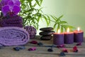 Spa still life with zen stones and aromatic candles Royalty Free Stock Photo