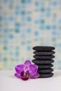 Spa stones and orchid close-up. Royalty Free Stock Photo