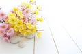 Spa stones with pink and yellow sakura flowers Royalty Free Stock Photo