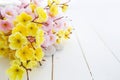 Spa stones with pink and yellow sakura flowers Royalty Free Stock Photo