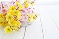 Spa stones with pink and yellow sakura flowers Royalty Free Stock Photo