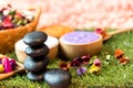 Spa Thai setting for aroma therapy and sugar and salt massage with flower on the bed, relax and healthy care.