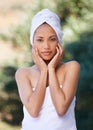 Spa, touch face and woman outdoor in towel for beauty, healthy skincare and body wellness. Relax, portrait and person at Royalty Free Stock Photo