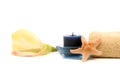 Spa towel, orchid, candle and starfish Royalty Free Stock Photo