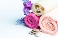 Spa towels rolls, flower and stones. Royalty Free Stock Photo