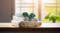 Spa towels on wooden table over blurred salon window background, Generative AI Royalty Free Stock Photo