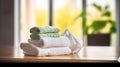 Spa towels on wooden table over blurred salon window background, Generative AI Royalty Free Stock Photo