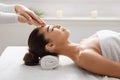 Spa Treatment. Calm Asian Woman Enjoying Relaxing Acupressure Head Massage Royalty Free Stock Photo