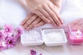 Spa treatment and product for female feet and manicure nails spa with candlelight and pink flower for relax and rest.
