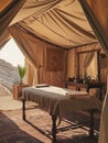 spa treatment room in tent with massage table