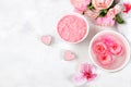 Spa and wellness composition with aromatic rose water, salt, roses and sakura, towels, aromatherapy and skin care, lifestyle Royalty Free Stock Photo