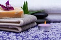 Spa Wellness Concept. Natural Back Scrubber,Goat`s milk Soap, Basalt Stones, Orchid Flower, Bamboo and Lavender Tea Light Candle Royalty Free Stock Photo