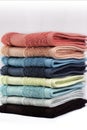 Multi colored bath towels stacked up. Spa and wellness Concept