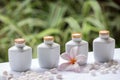 Spa and wellness setting with natural soap, stones and towel on the green background . Royalty Free Stock Photo