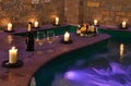 Spa with wine and candles Royalty Free Stock Photo