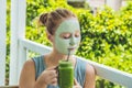 Spa Woman applying Facial green clay Mask. Beauty Treatments. Fr Royalty Free Stock Photo