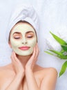 Spa woman applying facial mask Royalty Free Stock Photo