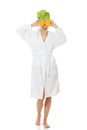 Spa woman in bathrobe with orange. Royalty Free Stock Photo