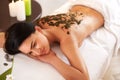 Spa Woman. Brunette Getting a Marine Algae Wrap Treatment in Spa Royalty Free Stock Photo