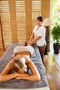 Spa Woman. Oil Leg Massage Therapy, Treatment. Body Skin Care Royalty Free Stock Photo