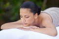 Spa, woman and sleeping on massage bed with break for wellness, zen and beauty treatment for body care. Person, relax Royalty Free Stock Photo