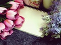 Space copy empty notebook with artificial flower background Royalty Free Stock Photo