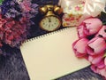 Space copy empty notebook with artificial flower background Royalty Free Stock Photo