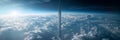 A space elevator transporting tourists from Earth into orbit, towering above the clouds.