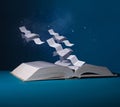 Space fighters are created from pages. Spaceships fly over an open book