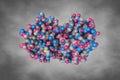 Space-filling molecular model of sugar binding protein - human galectin-2 (dimer) on gray background. Rendering