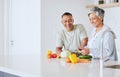 Space, health and cooking with old couple in kitchen for food, lunch and helping. Wellness, nutrition and diet with Royalty Free Stock Photo