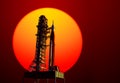 Space Launch System On Launchpad On Background Of Red Sun Royalty Free Stock Photo