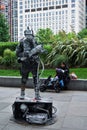 Space man/tech man a street performer at the Jubilee garden, London, England