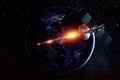 Space military satellite, a weapon in space shoots a laser against the background of the earth. Attack, technology, space war. Royalty Free Stock Photo