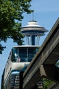 The Space Needle towers over the Seattle Monorail