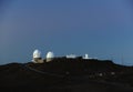 Space observatories at sunrise on top of Haleakala crater on Maui.