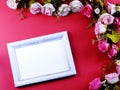 Space of photo frame with artificial rose flower Royalty Free Stock Photo