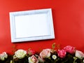 Space of photo frame with artificial rose flower Royalty Free Stock Photo