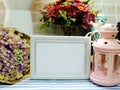 Space photo frame home decor with dried flower and pink candle light Royalty Free Stock Photo