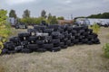 Space for playing paintball with the paint marks after fights. Abandoned paintball playground with barricades made of old tires Royalty Free Stock Photo