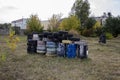 Space for playing paintball with the paint marks after fights. Abandoned paintball playground with barricades made of old tires