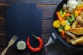 The space for the recipe for spicy food on wooden background