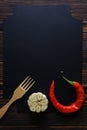 The space for the recipe for spicy food on wooden background