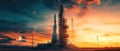 space rocket on launch pad, panoramic shot of the sky and the setting sun in the background Royalty Free Stock Photo
