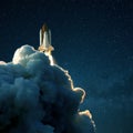 Space rocket launches into space against a starry blue sky. Ship shuttle with clouds of smoke.