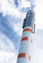 Space rocket over blue sky Royalty Free Stock Photo